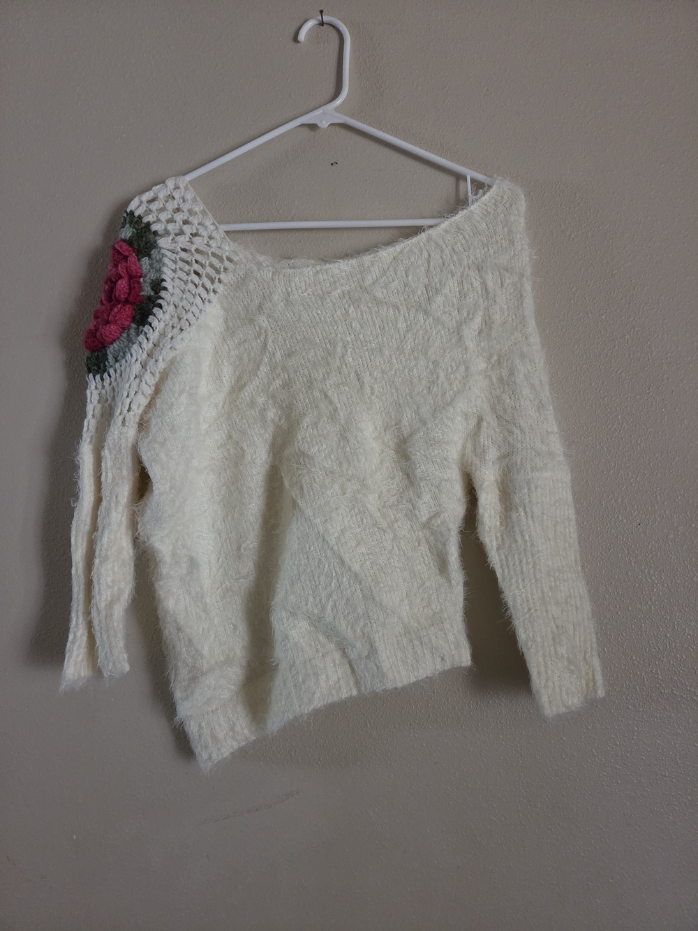Cozy Cream Knit Sweater with Pink Crochet Flower Shoulder